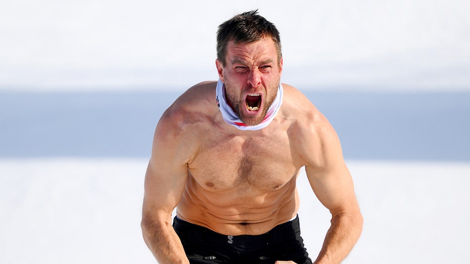 Austrian snowboarder strips down in cold temperatures during wild celebration after winning Olympic gold