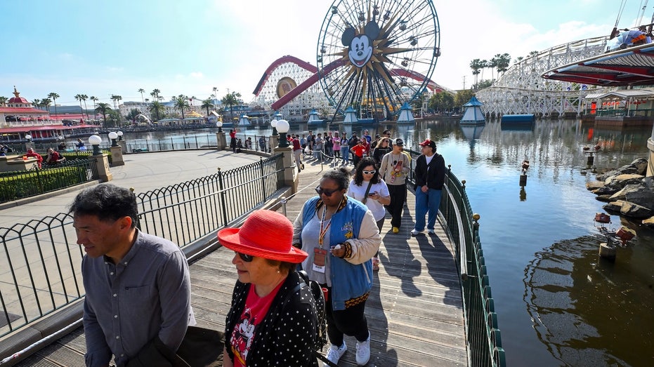 Measles exposure risk identified at major airport and theme park, health officials warn