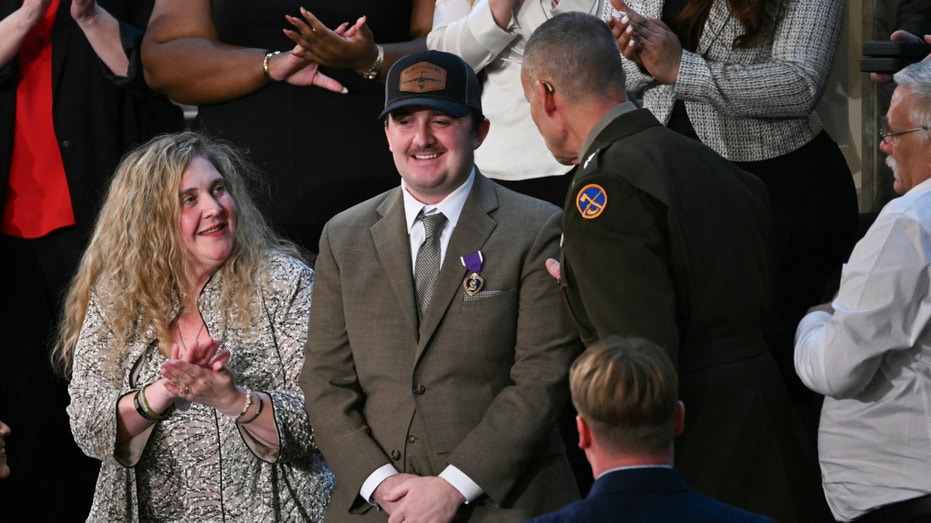 Trump awards Purple Hearts to National Guard members ambushed in Washington, DC: ‘We love you all’