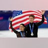 Madison Chock and Evan Bates wave
