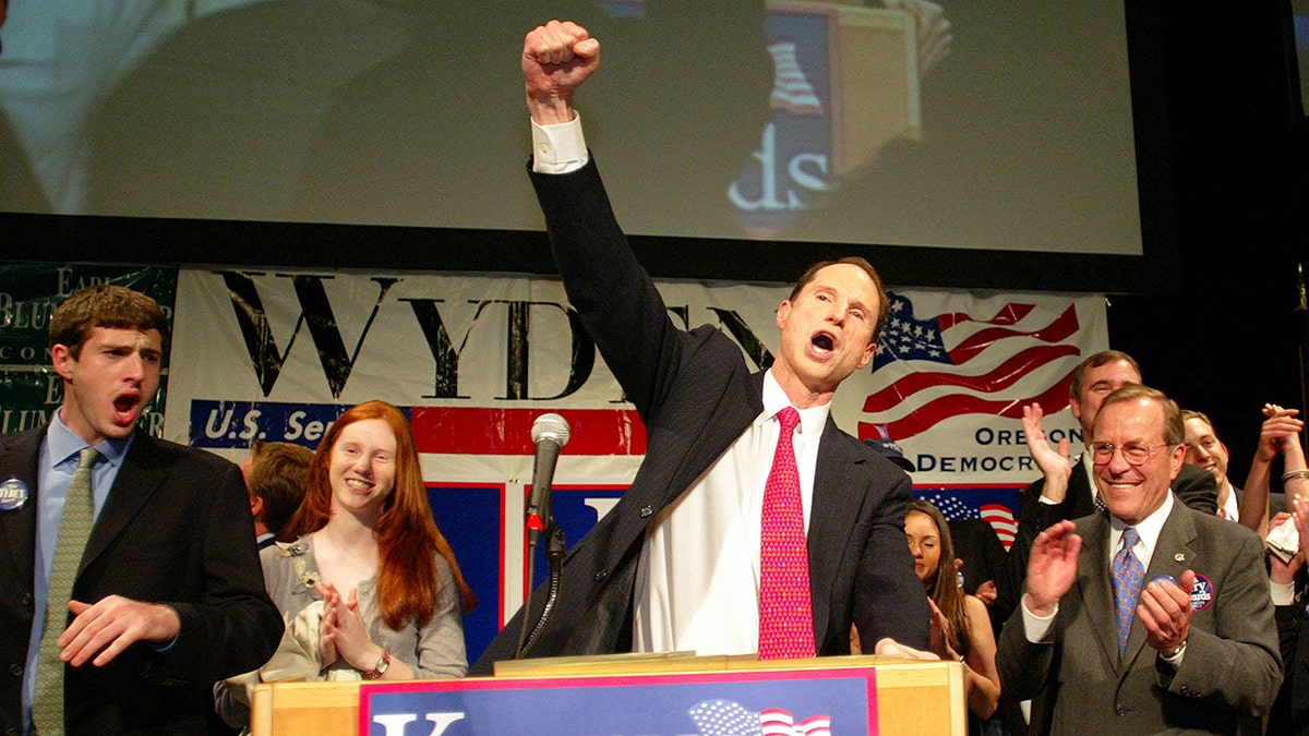 Adam Wyden seen next to his dad, current US Senator from Oregon, Ron Wyden