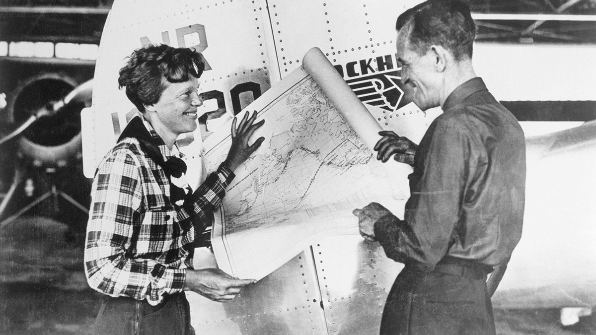Amelia Earhart with her navigator