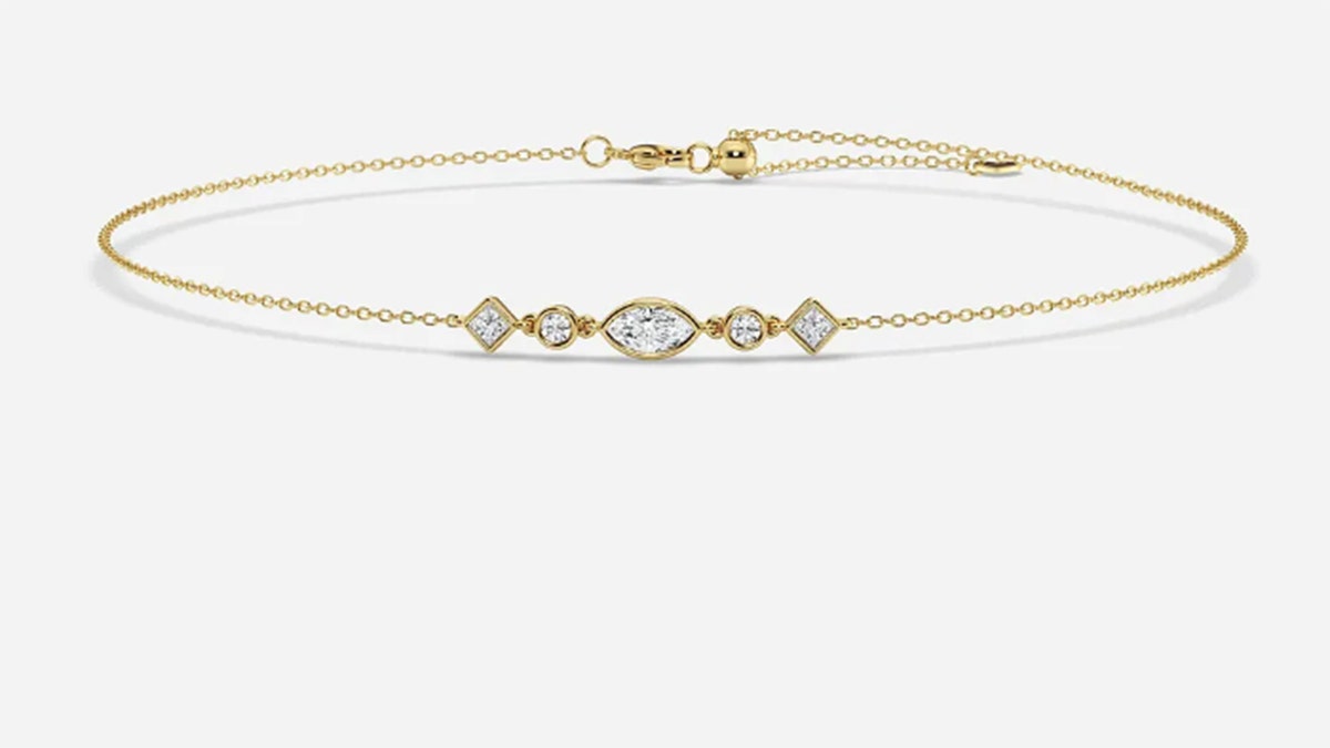 The multi-shaped stones on this dainty anklet total 1/2 carat.