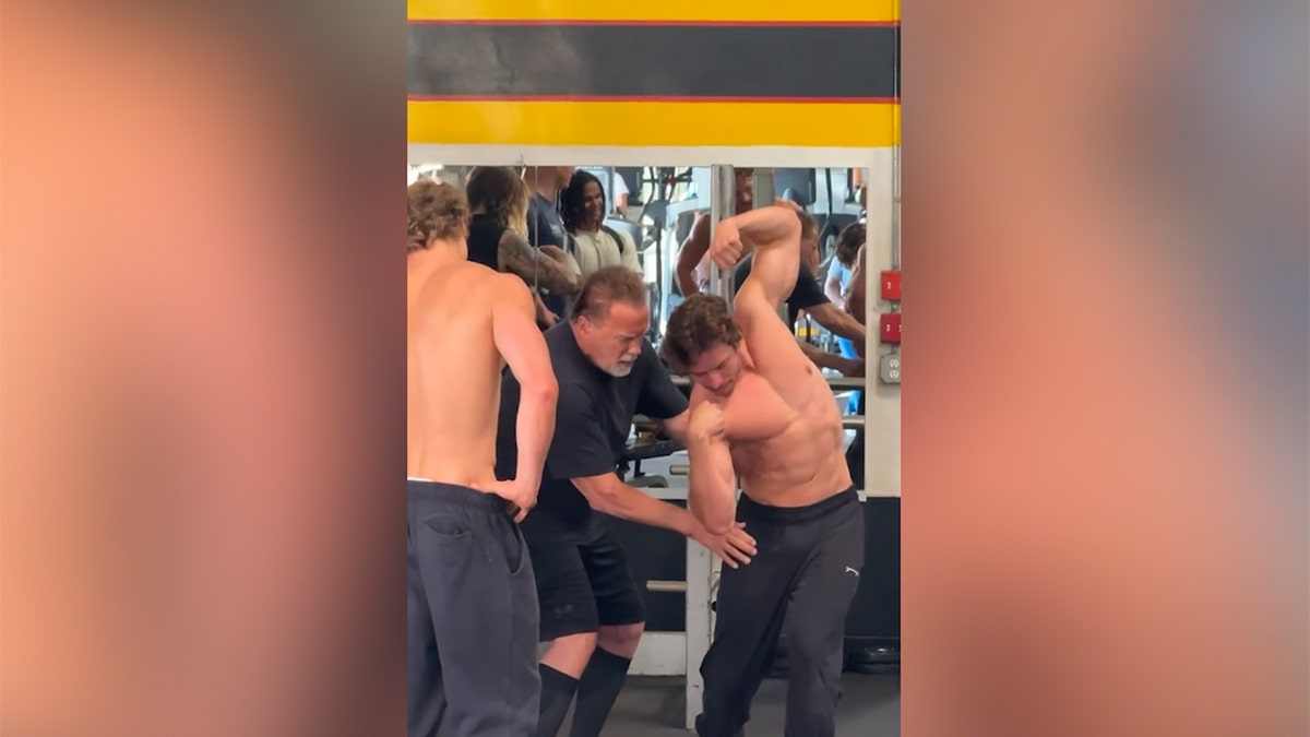 Arnold Schwarzenegger passes bodybuilding torch to lookalike son Joseph Baena