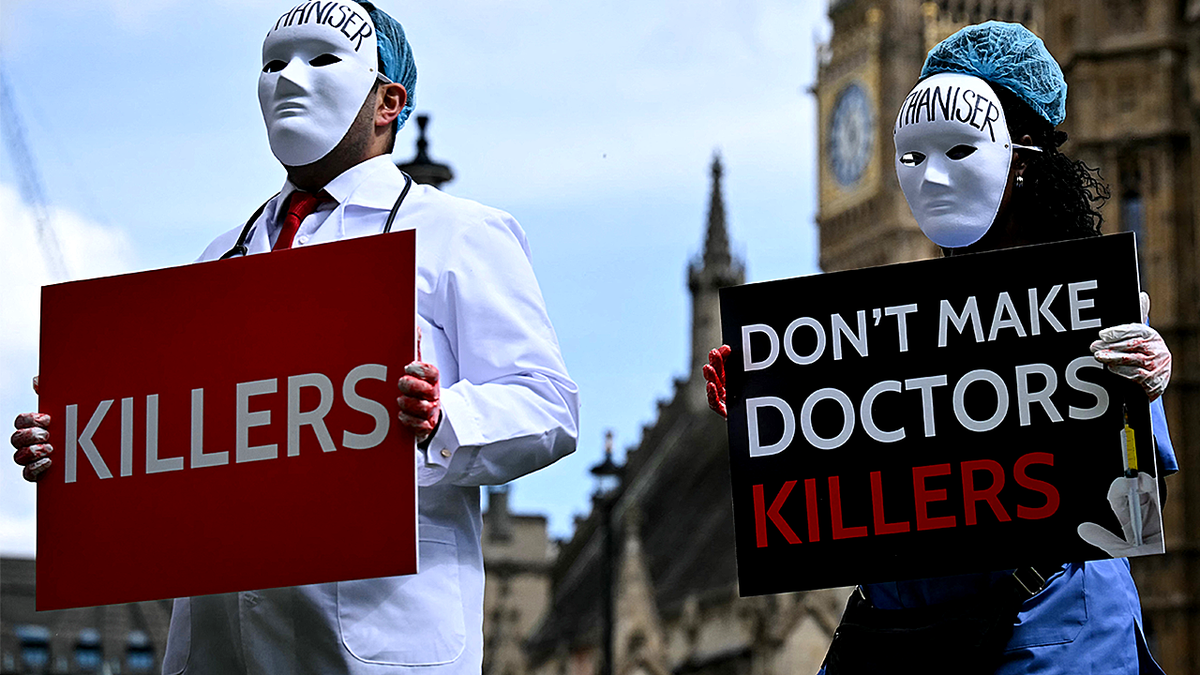 assisted suicide protesters in masks