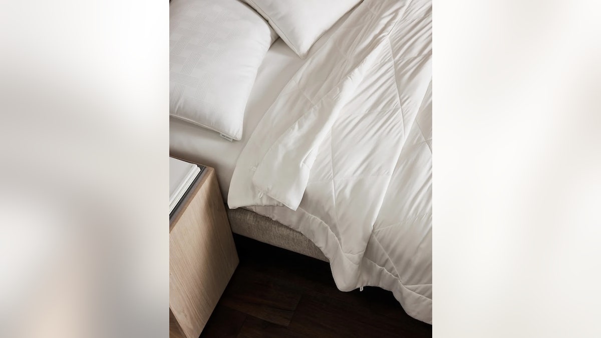 Throw a bamboo comforter over your sheets for an added layer of softness.