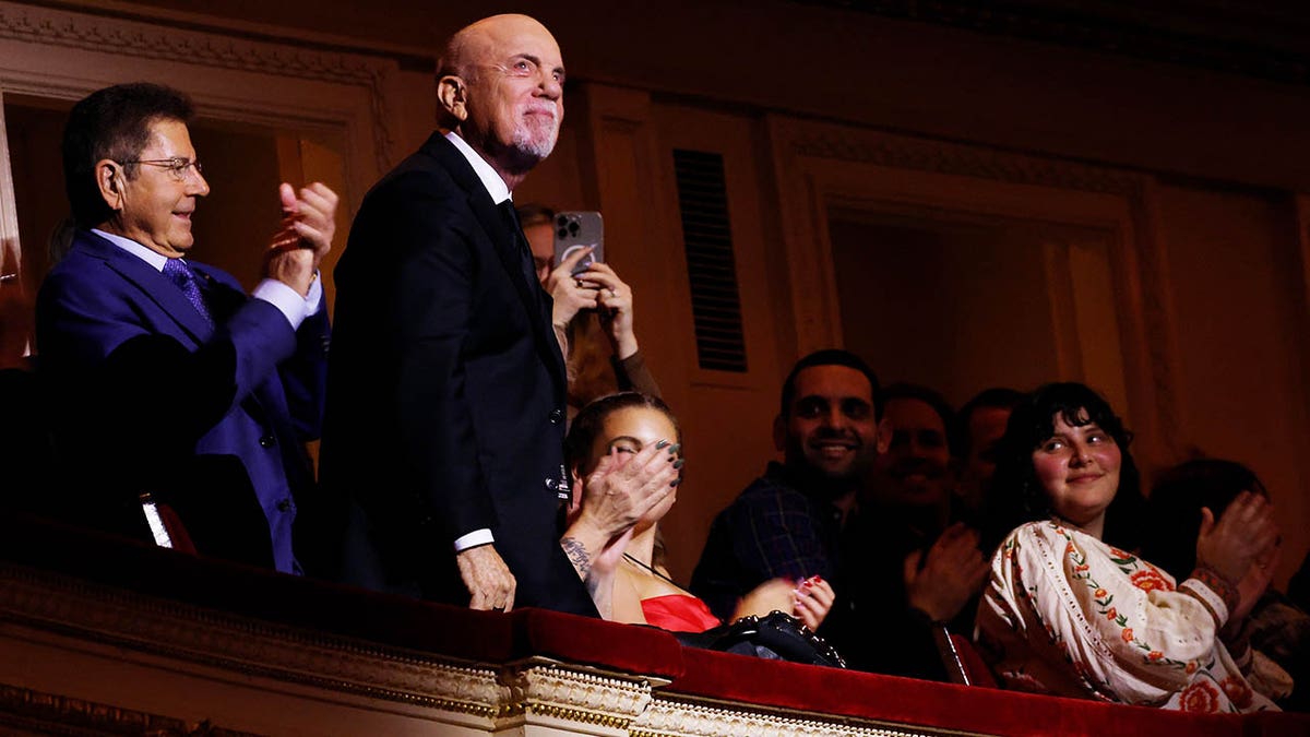 Billy Joel poses at Carnegie Hall during 