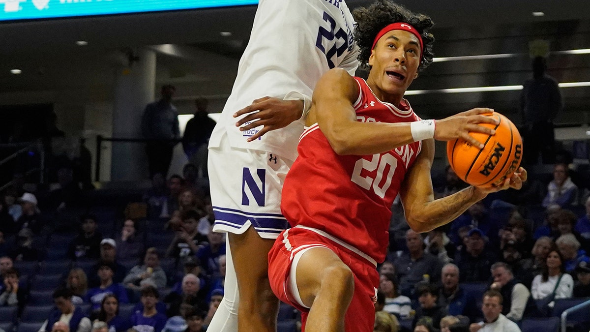 Michael McNair takes the ball to the basket