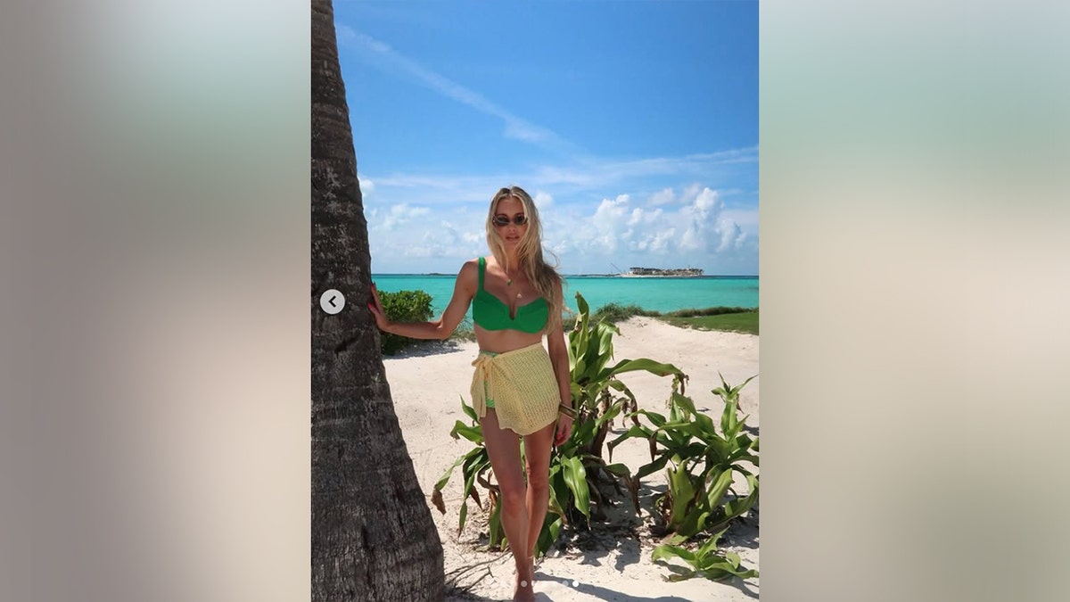 Brittany Aldean second green bikini pose during spring break family vacation March 2026