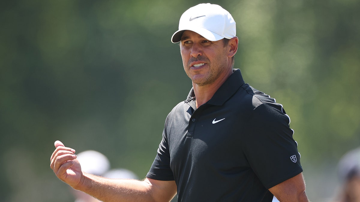 Brooks Koepka reacts on course