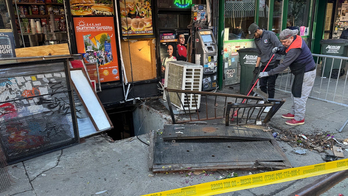 Damaged basement doors extracurricular Manhattan bodega aft taxi crash.