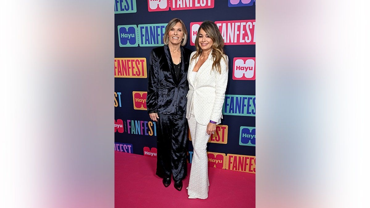 Sandy Yawn and Leah Shafer standing together at an event.