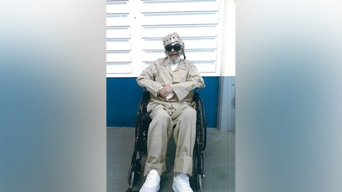 Charles Burton in a wheelchair.