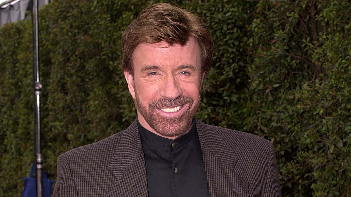 Chuck Norris at an award show for stunts.