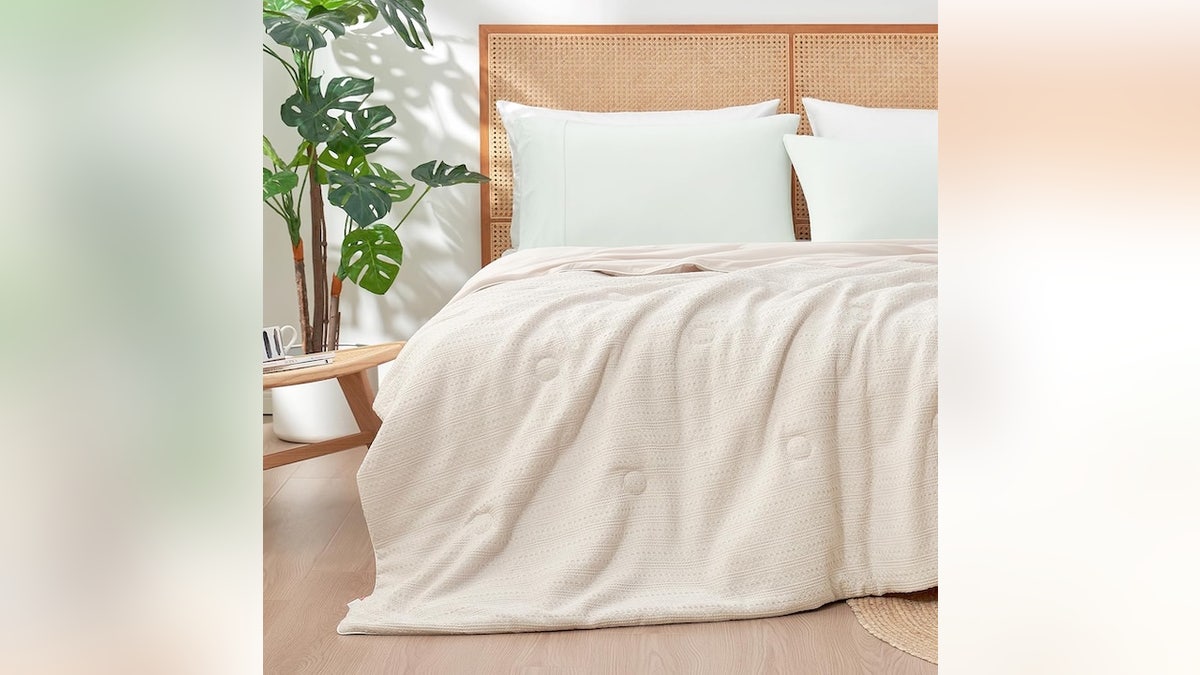 Swap out heavy winter bedding for something lighter.
