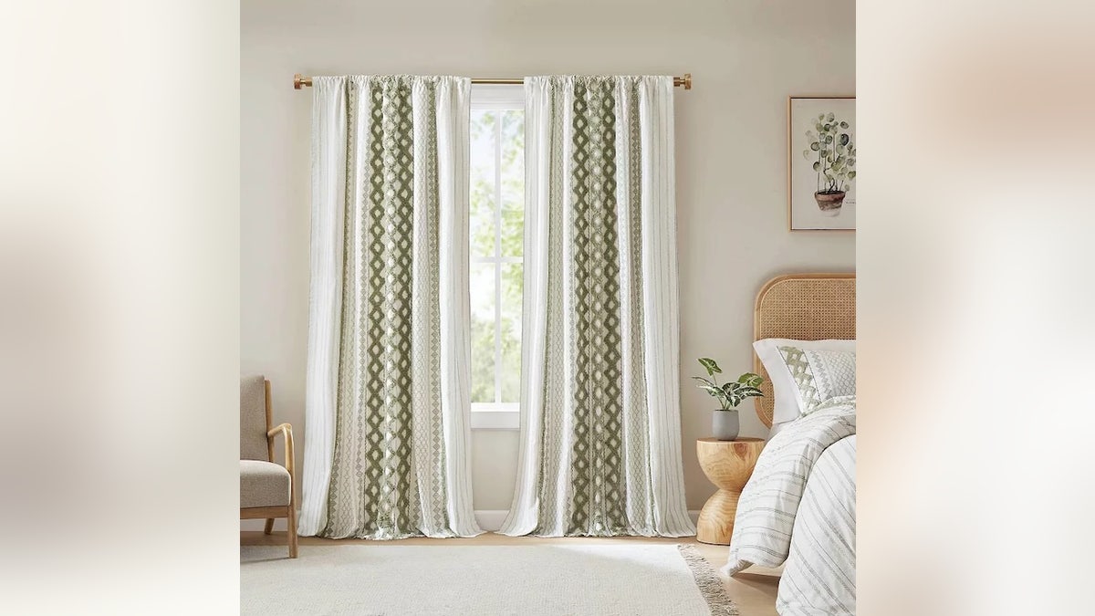 Let in more light with airy curtains.