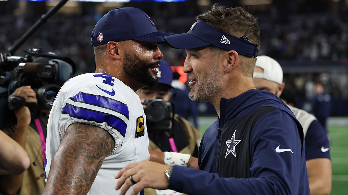 Dak Prescott and Brian Schottenheimer