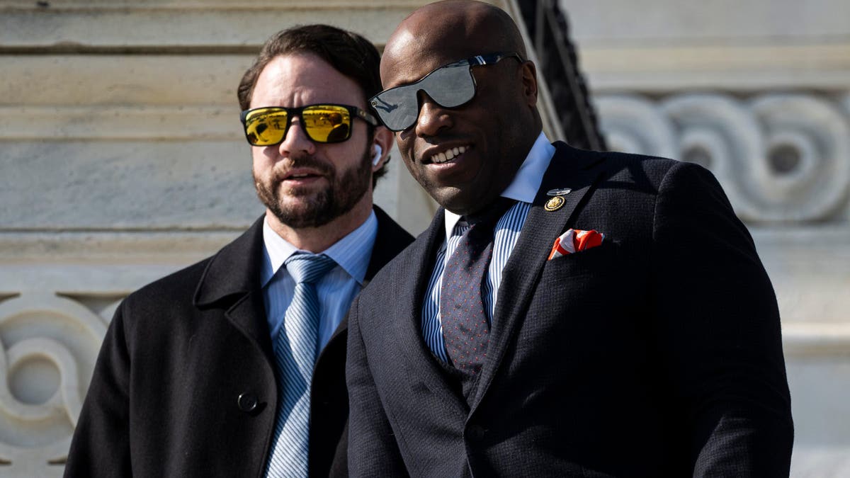 Rep. Dan Crenshaw, a Republican from Texas (left) and Rep. Wesley Hunt, (right) a Republican from Texas, depart during a vote at the US Capitol in Washington, DC, US, on Tuesday, Feb. 3, 2026.