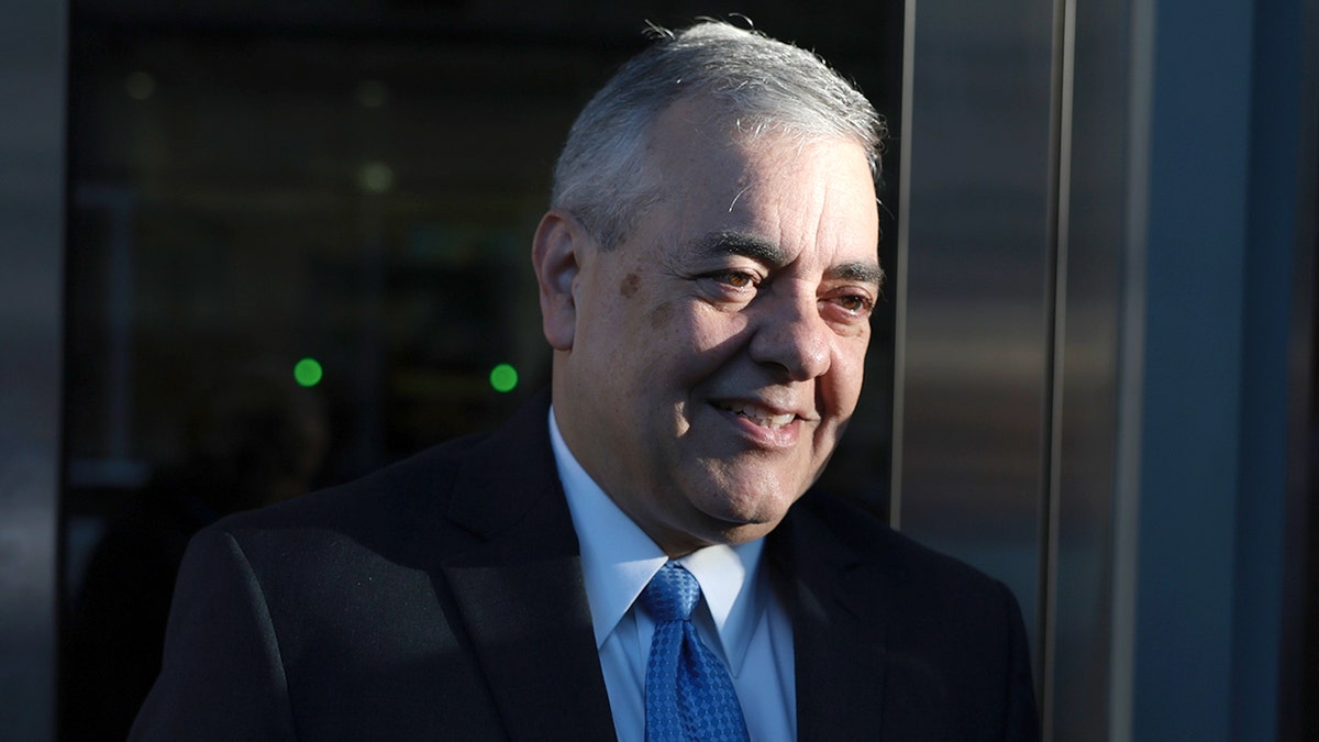 David Rivera speaking to the media while standing outside a building in Miami.