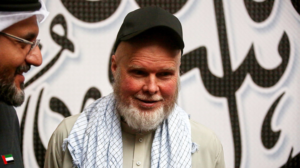 Dennis Coyle smiles after release