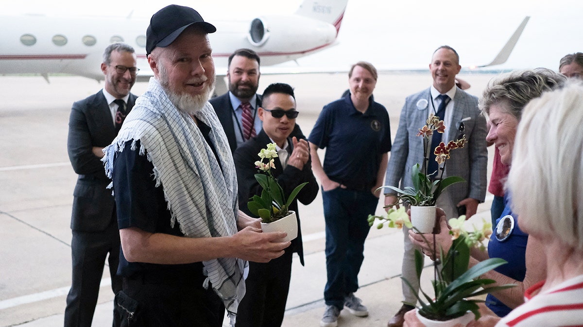 American Dennis Coyle greeted after landing in San Antonio, Texas