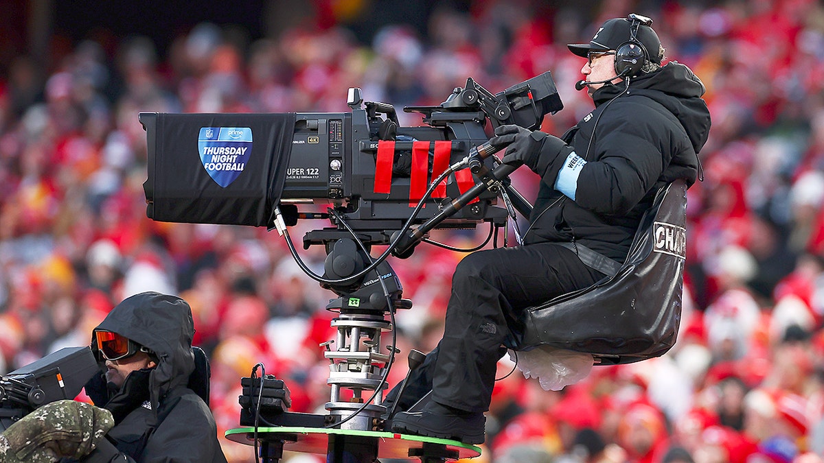The Amazon Prime Video Thursday Night Football logo displayed on a television camera during a game at Arrowhead Stadium.
