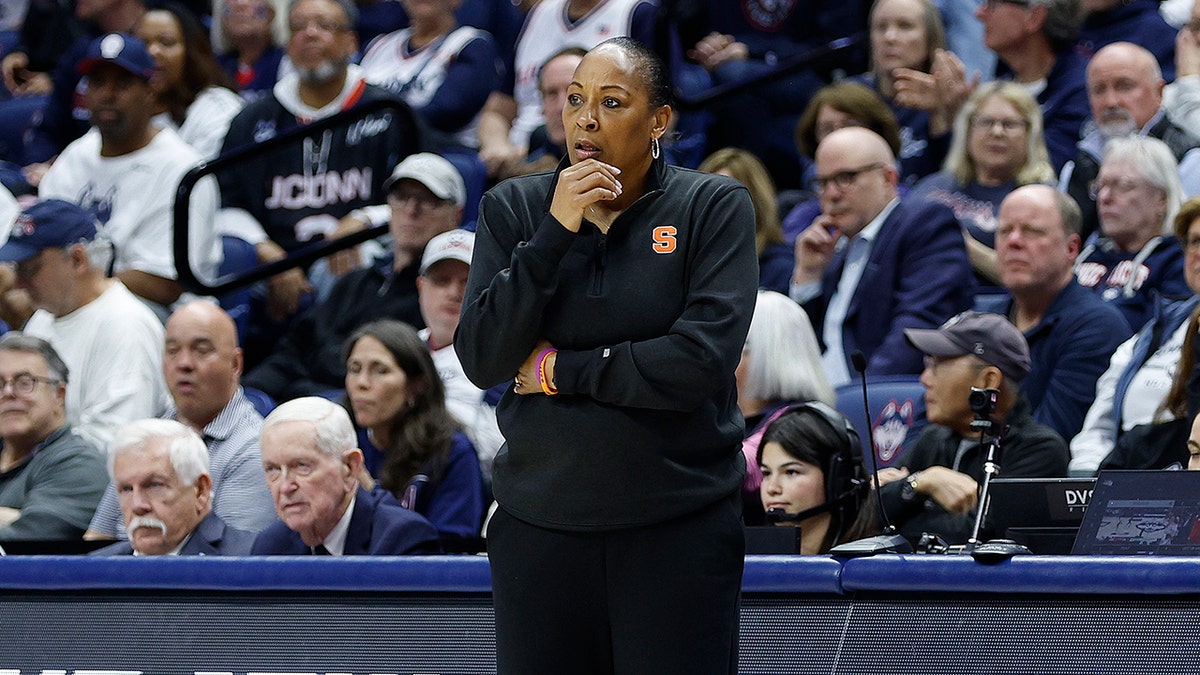 Felisha Legette-Jack looks on court
