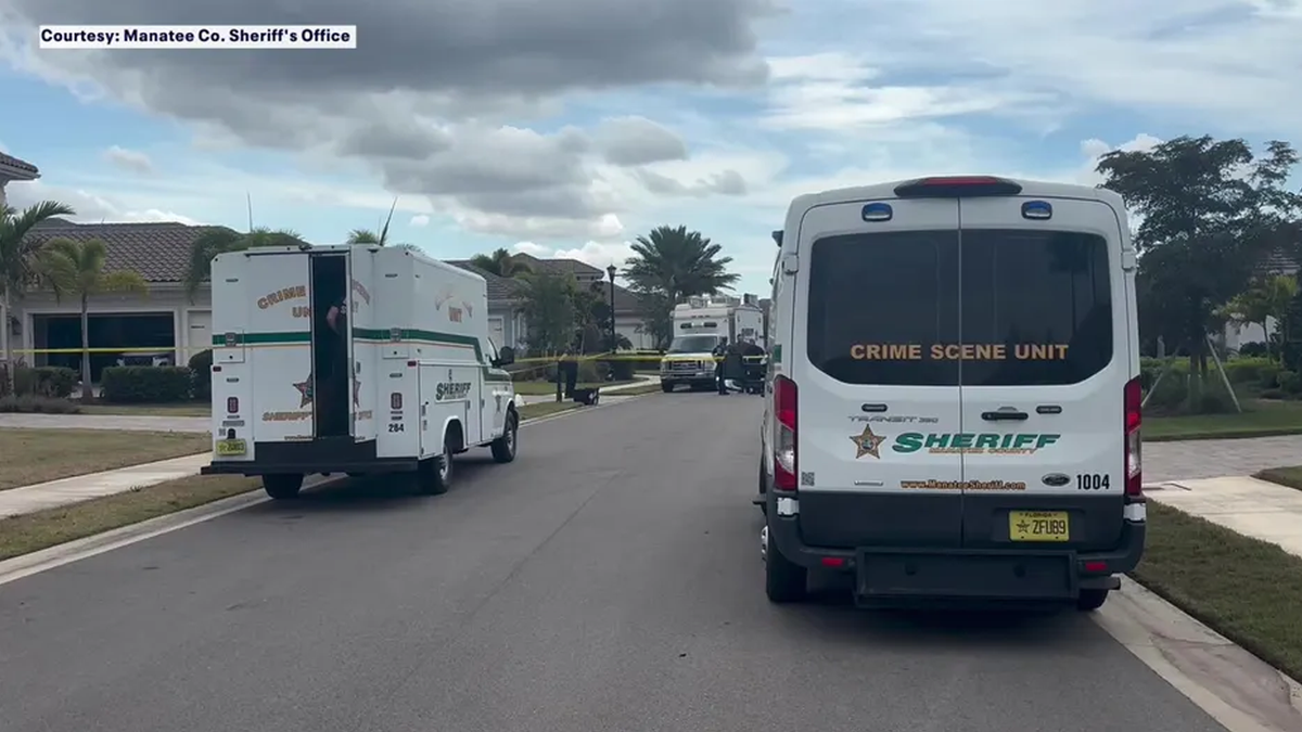Manatee County Sheriff’s Office crime scene vehicles parked outside a Lakewood Ranch, Florida neighborhood