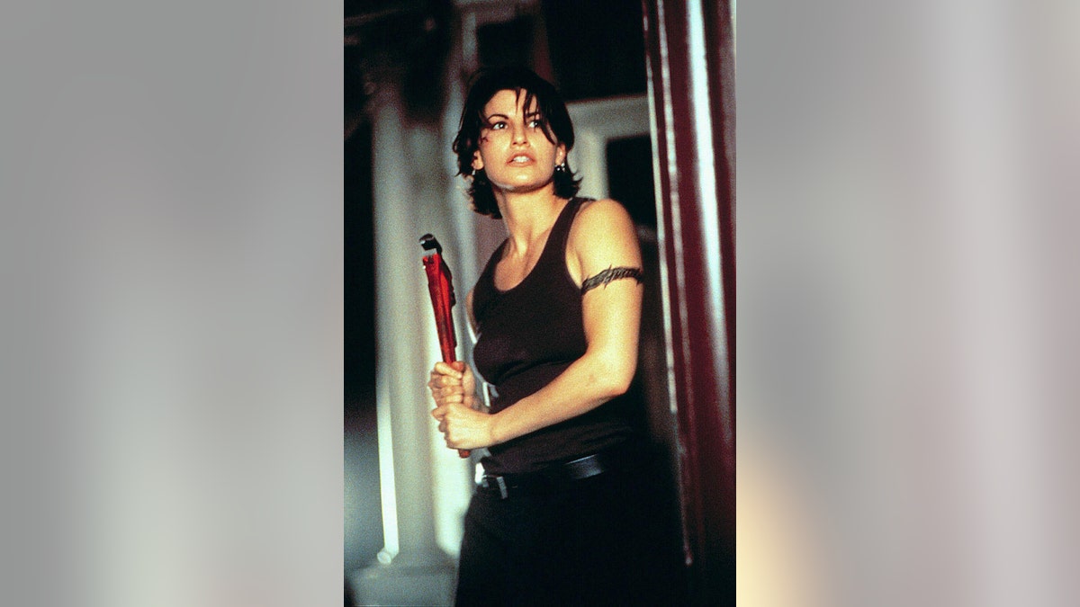 Gina Gershon acting out a scene from "Bound."