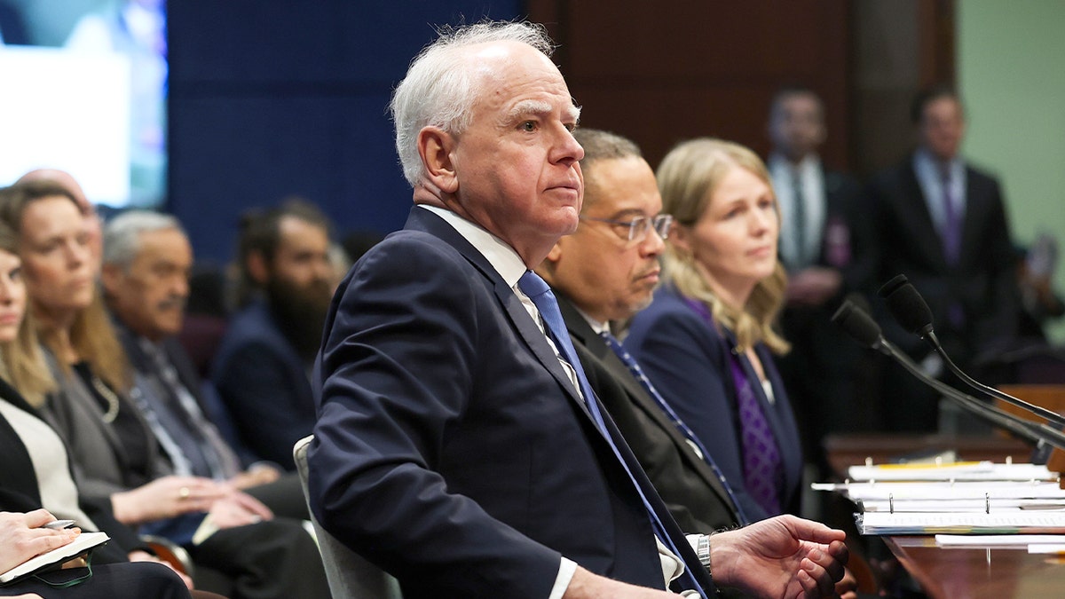 Minnesota Gov. Tim Walz speaks before a congressional panel inside the U.S. Capitol.