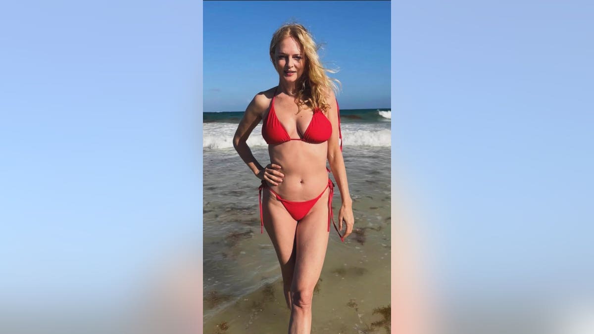 Heather Graham in a red bikini