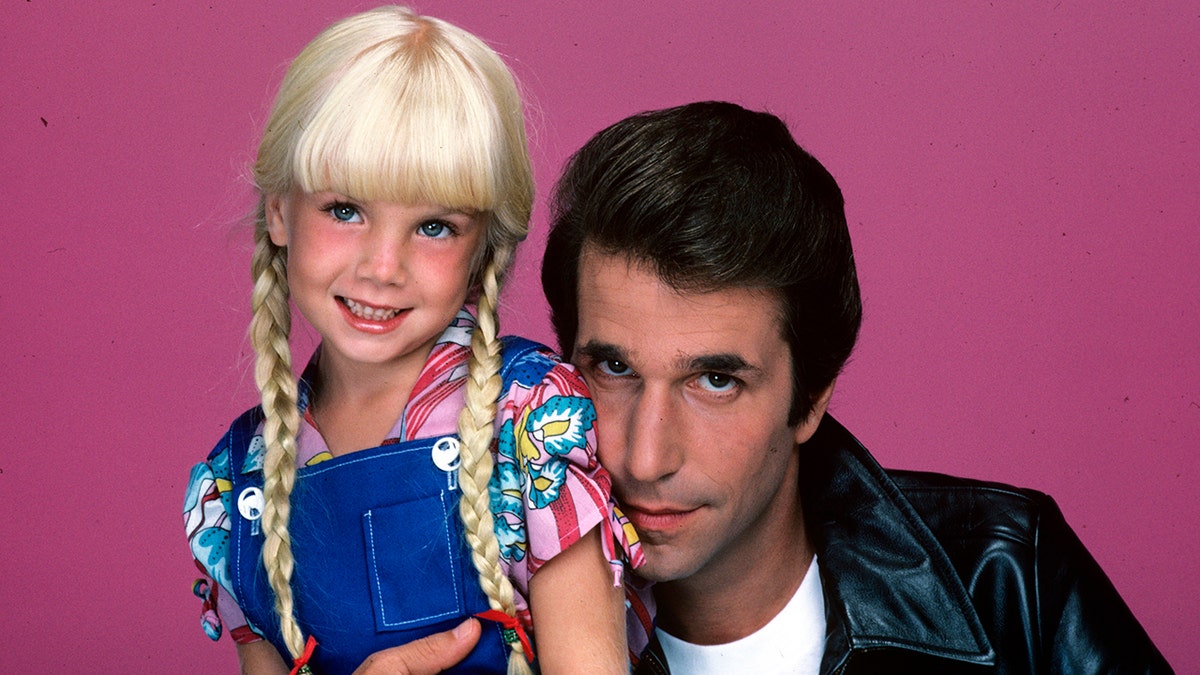 Heather O'Rourke posing alongside Henry Winkler as The Fonz.