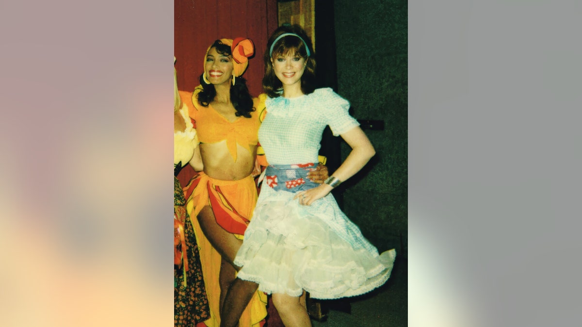 Holly Hallstrom in a light blue costume dress in the 1990s.