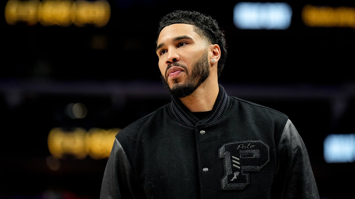 Jayson Tatum looks on court