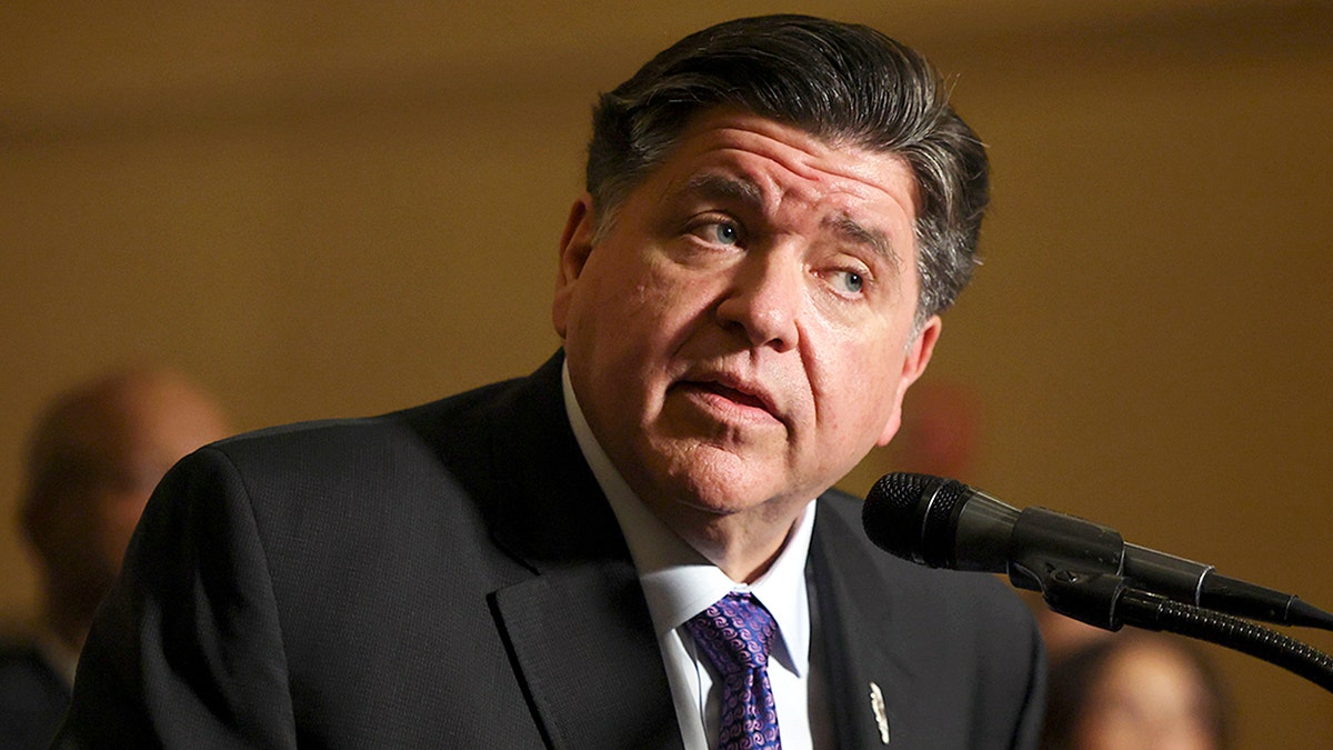 JB Pritzker answering questions at a public event.