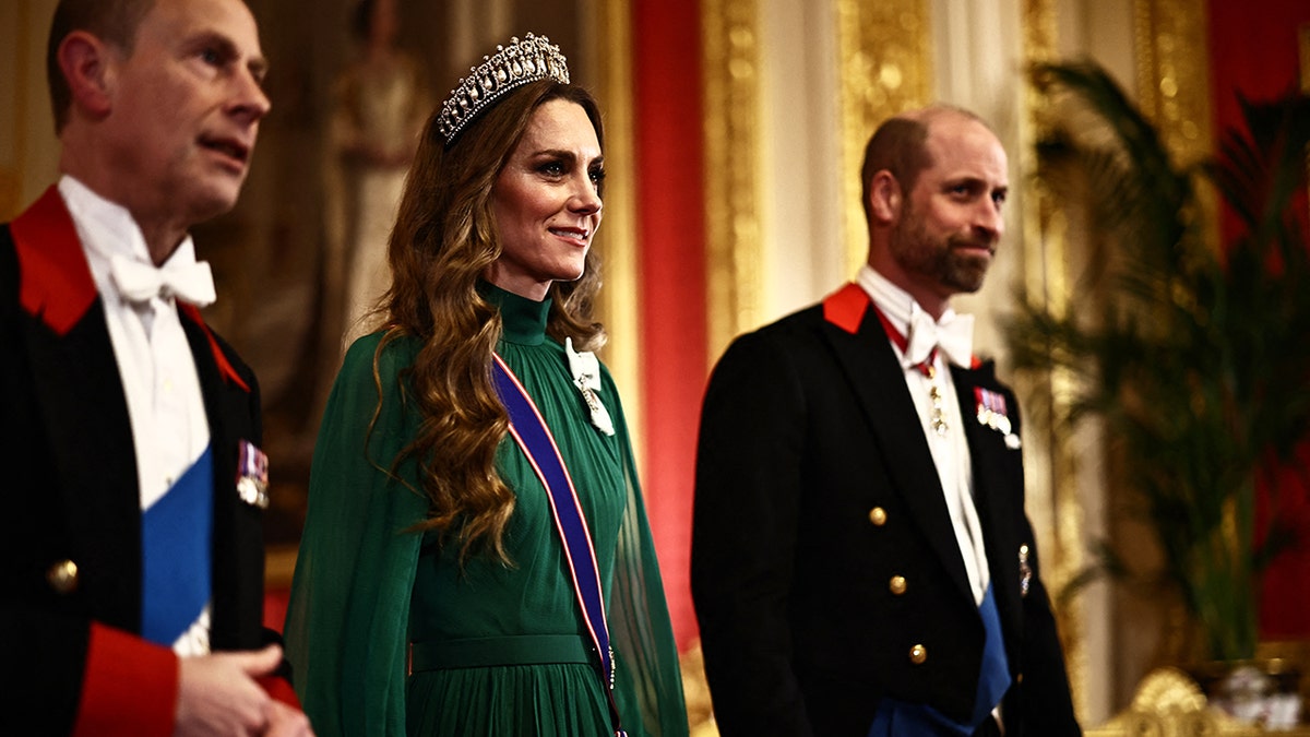 Kate Middleton walking alongside her husband Prince William and uncle-in-law, Prince Edward.