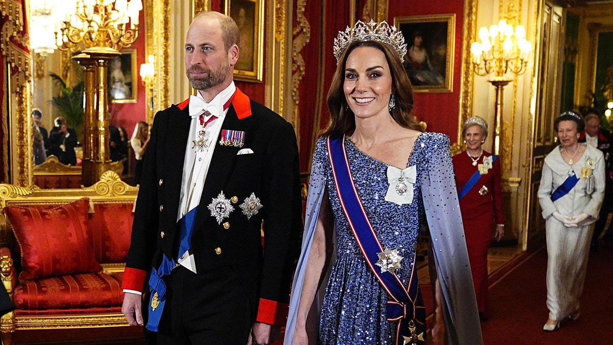 Kate Middleton wearing a purple sparkly dress and a tiara.