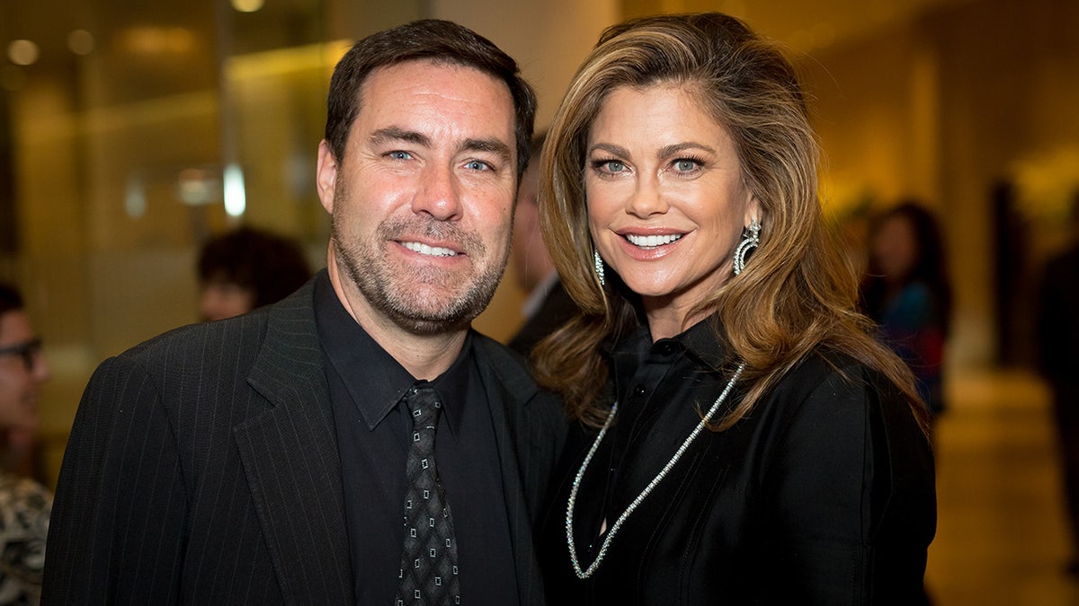 Kathy Ireland joins Stephen Roseberry at an event.