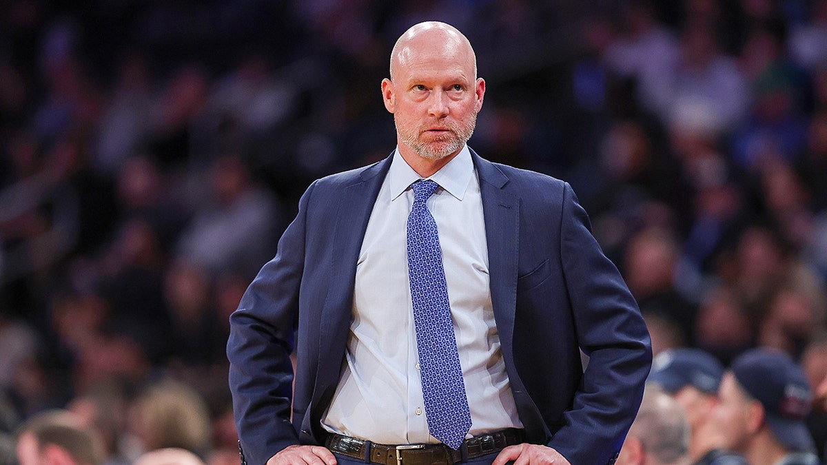 Kevin Willard looks on court