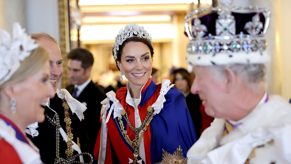 Kate Middleton smiling at King Charles following his coronation.
