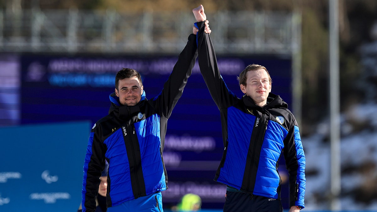 Maksym Murashkovskyi celebrates with Vitaly Trush