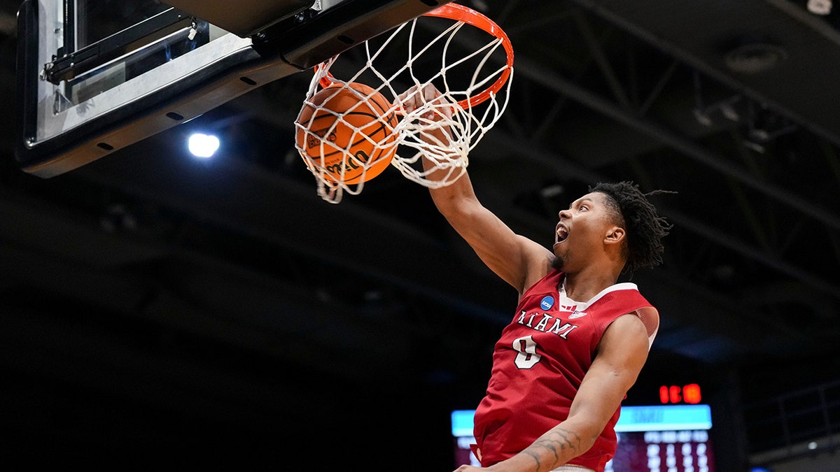 Eian Elmer throws down   a dunk