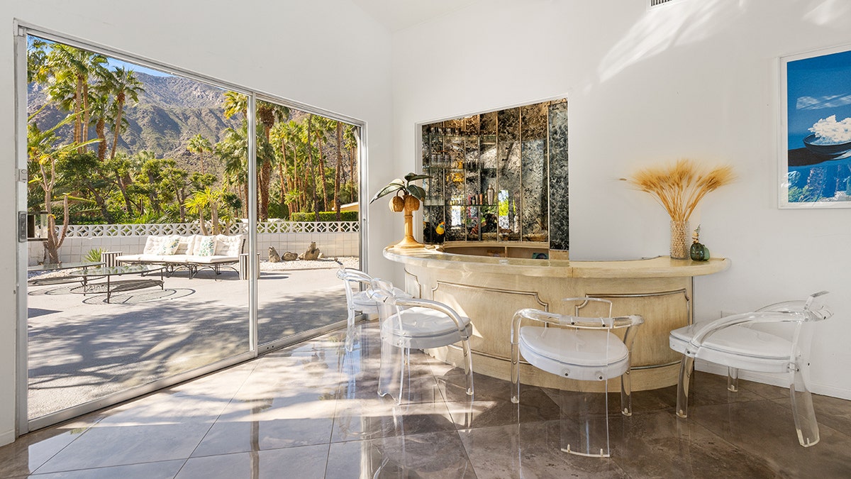 The living room also features a bar.