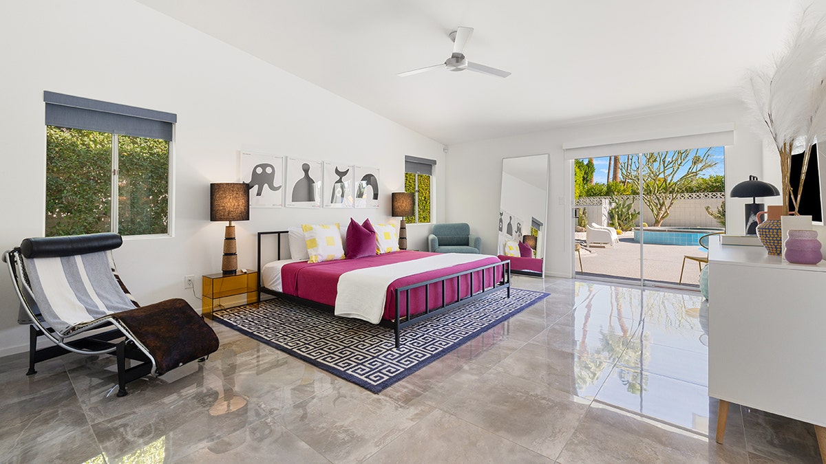 The primary bedroom features direct access to the backyard.