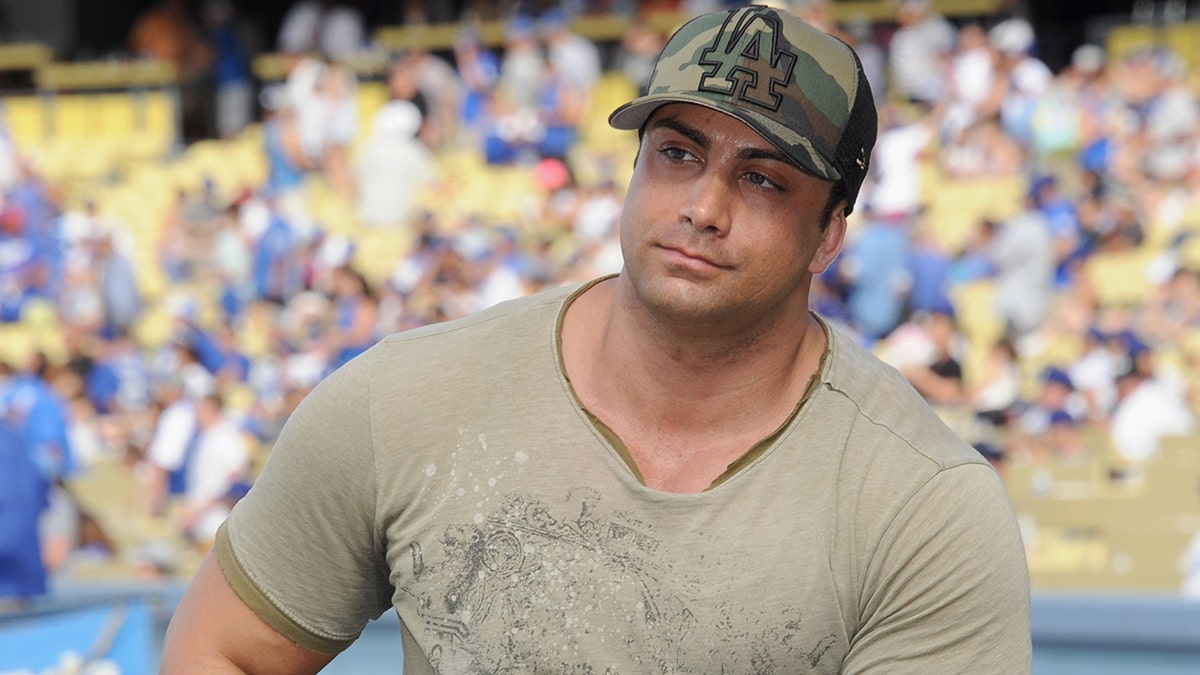 Actor Marty York standing on the baseball field at Dodger Stadium before a game and screening of "The Sandlot."
