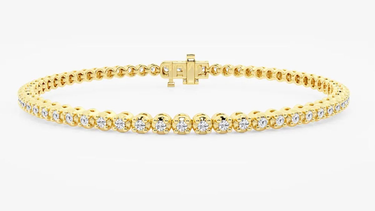A classic tennis bracelet shines on any wrist.