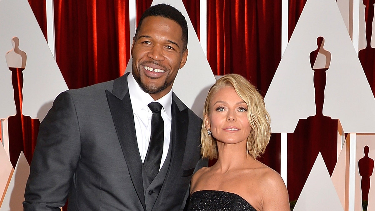 Michael Strahan and Kelly Ripa at the Academy Awards in February 2015.