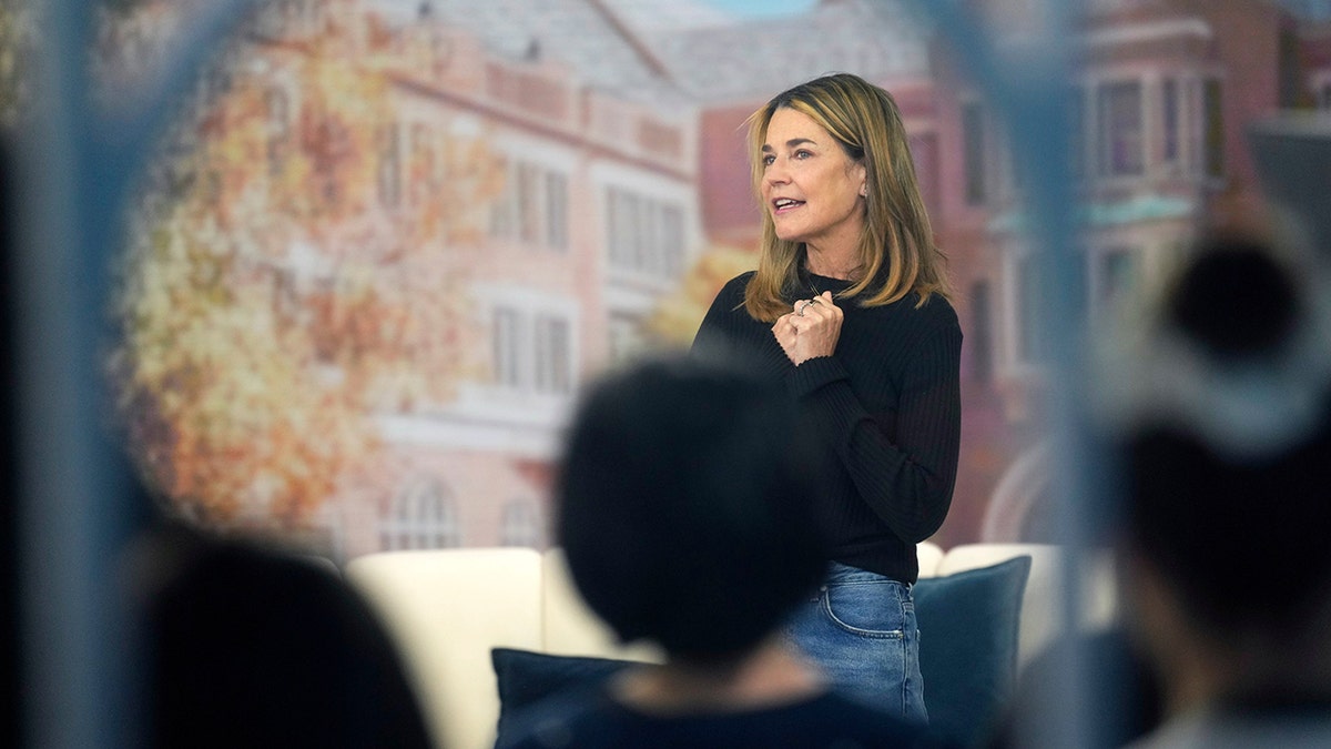 Savannah Guthrie standing on the Today show set at Rockefeller Plaza.