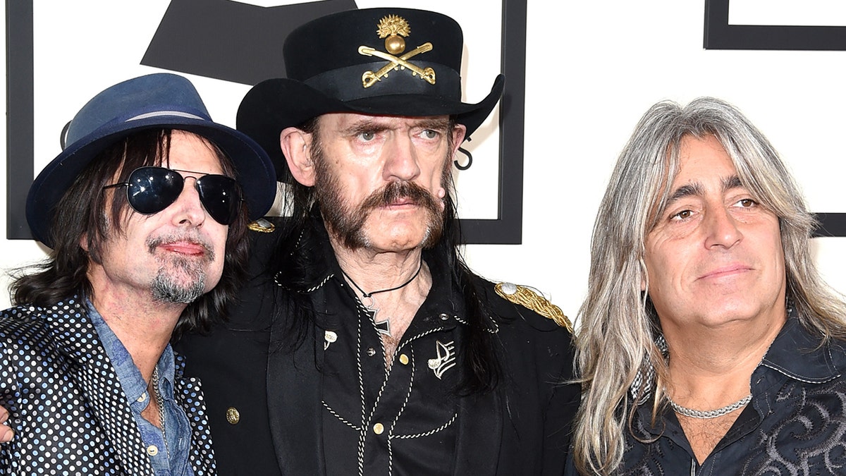 Phil Campbell, Lemmy, and Mikkey Dee of Motörhead posing together at the 57th Annual GRAMMY Awards at the STAPLES Center in Los Angeles, California, February 8, 2015.