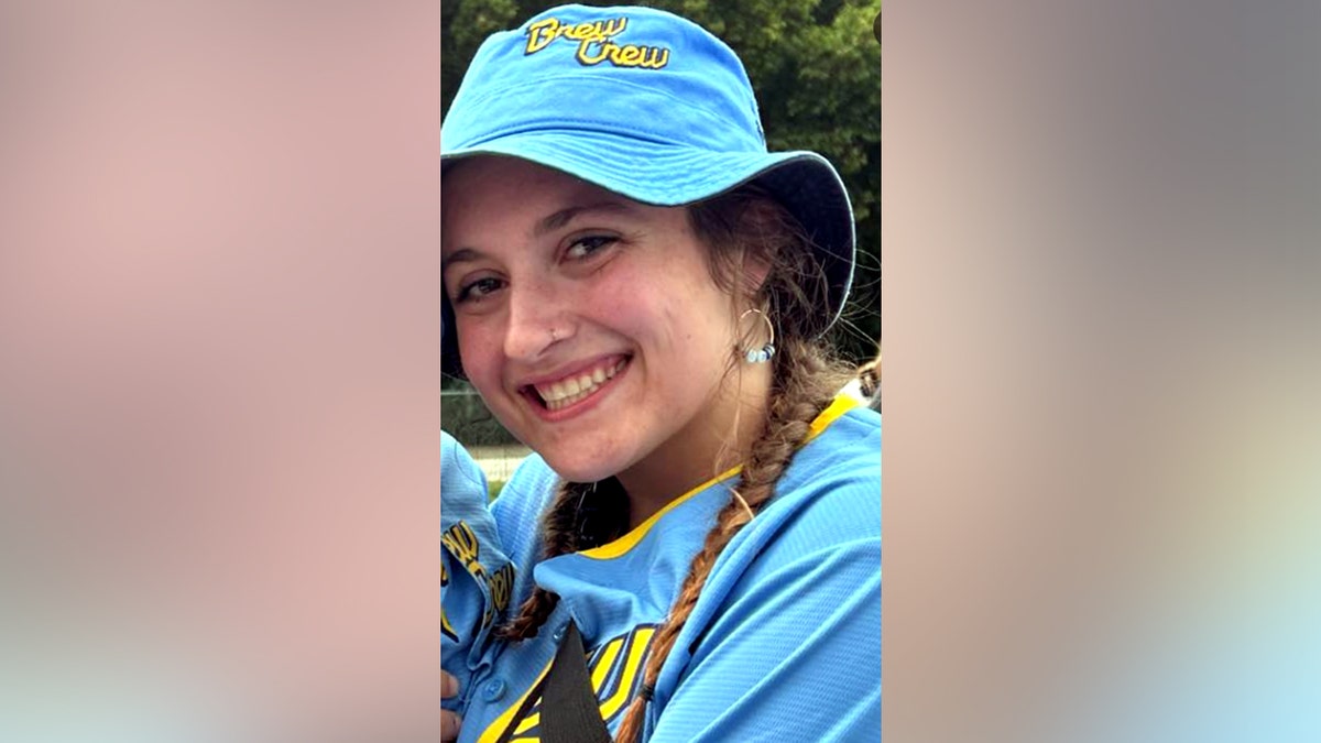 Nadia Horn smiling in Milwaukee Brewers' gear